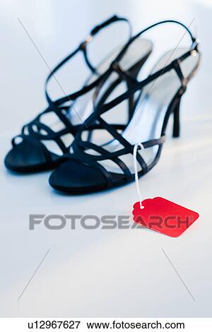 Stock Photo - Pair of new high-heeled shoes. Fotosearch