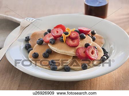Pancakes with fruits View Large Photo Image Stock Photo - Pancakes with fruits. Fotosearch