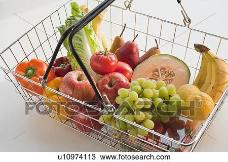 Paper bag filled with vegetables and fruits View Large Photo Image Stock Image - Paper bag filled with vegetables and fruits. Fotosearch