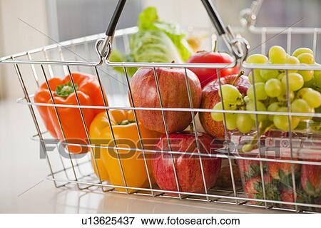 Paper bag filled with vegetables and fruits View Large Photo Image Stock Photo - Paper bag filled with vegetables and fruits. Fotosearch