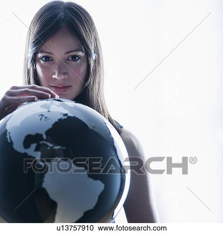 Portrait of businesswoman holding globe View Large Photo Image Stock Image - Portrait of businesswoman holding globe. Fotosearch