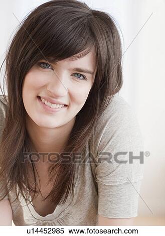 Portrait of happy young woman View Large Photo Image Stock Photography - Portrait of happy young woman. Fotosearch
