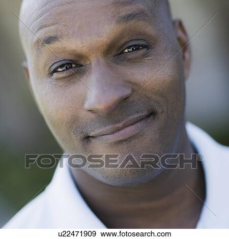 "Portrait of man smiling, close-up" View Large Photo Image Stock Photo - "Portrait of man smiling, close-up". Fotosearch