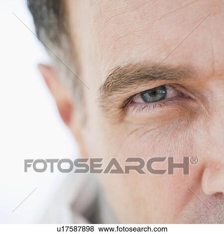 Stock Photo - "Portrait of mature businessman, close-up". Fotosearch