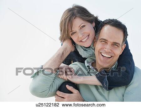 "Portrait of mature couple, smiling" View Large Photo Image Stock Image - "Portrait of mature couple, smiling". Fotosearch