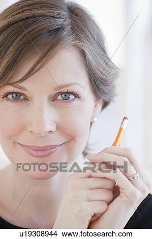 Picture - "Portrait of successful mature businesswoman, smiling". Fotosearch
