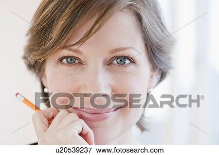 "Portrait of successful mature businesswoman, smiling" View Large Photo Image Stock Photo - "Portrait of successful mature businesswoman, smiling". Fotosearch