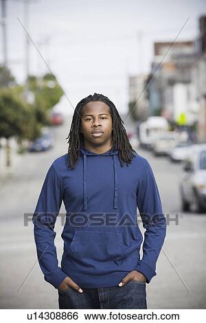 "Portrait of teenage boy (16-17) walking in street, San Francisco, California, USA" View Large Photo Image Stock Photograph - "Portrait of teenage boy (16-17) walking in street, San Francisco, California, USA". Fotosearch