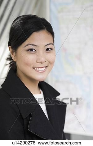 Portrait of young woman waiting at bus stop View Large Photo Image Stock Photograph - Portrait of young woman waiting at bus stop. Fotosearch