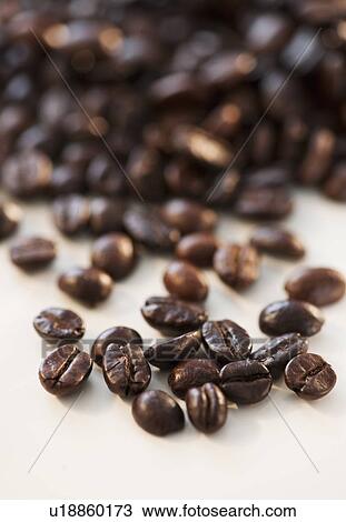 Stock Image - "Roast coffee beans, studio shot". Fotosearch