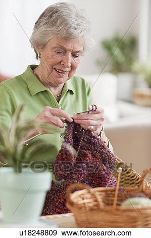 Senior woman knitting View Large Photo Image Stock Photo - Senior woman knitting. Fotosearch