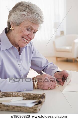 Senior woman writing View Large Photo Image Stock Photograph - Senior woman writing. Fotosearch
