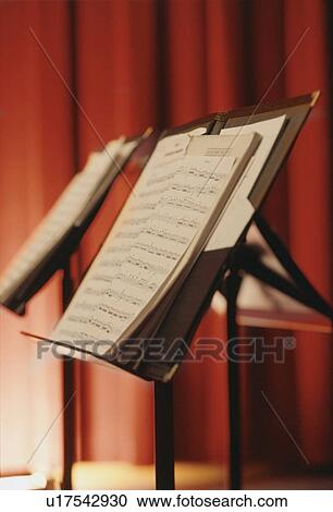 Stock Image - Sheet music on stand. Fotosearch
