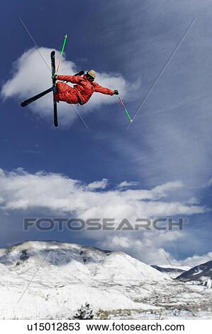 Stock Image - "Skier jumping, Aspen, Colorado, USA ". Fotosearch