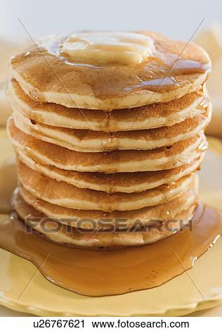 Stock Image - Stack of pancakes with syrup. Fotosearch