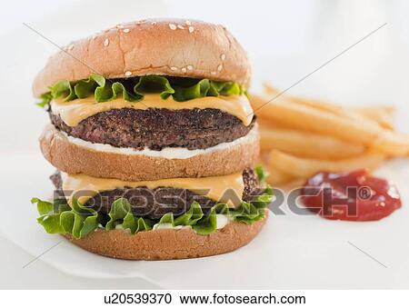 Stock Image - Studio shot of hamburger. Fotosearch