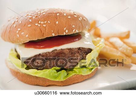 Stock Photograph - Studio shot of hamburger. Fotosearch