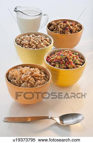 "Studio shot of Whole grains, cereal, puffed rice, corn puffs, granola, flakes" View Large Photo Image Stock Photography - "Studio shot of Whole grains, cereal, puffed rice, corn puffs, granola, flakes". Fotosearch