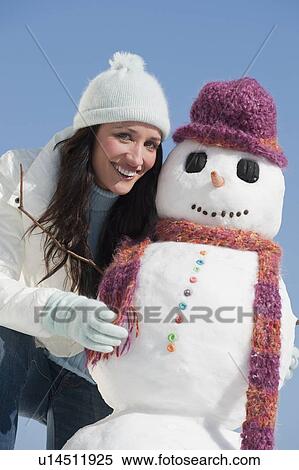 Stock Photography - "Woman and snowman, portrait". Fotosearch