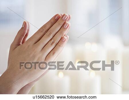"Woman praying, close-up of hands" View Large Photo Image Stock Image - "Woman praying, close-up of hands". Fotosearch