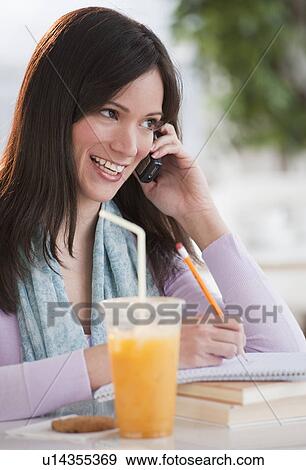Stock Photo - Woman talking on phone. Fotosearch