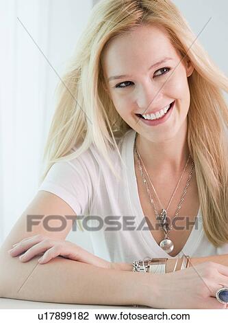 Young woman flirting View Large Photo Image Stock Image - Young woman flirting. Fotosearch