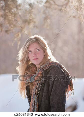 Young woman outdoors View Large Photo Image Stock Image - Young woman outdoors. Fotosearch