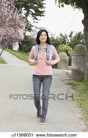 "Young woman walking in park, San Francisco, California, USA" View Large Photo Image Stock Image - "Young woman walking in park, San Francisco, California, USA". Fotosearch