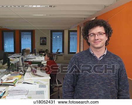 Stock Image - Architect in office. Fotosearch