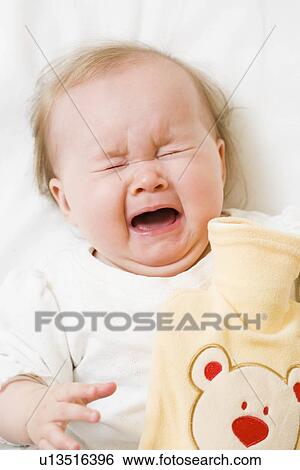 Baby crying View Large Photo Image Stock Photograph - Baby crying. Fotosearch