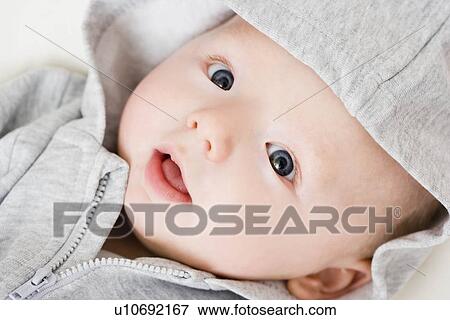 Baby looking up View Large Photo Image Stock Photo - Baby looking up. Fotosearch
