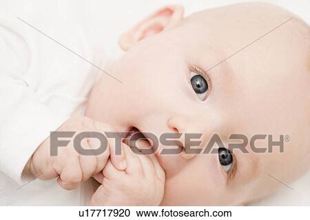 Stock Image - Baby smiling into camera. Fotosearch