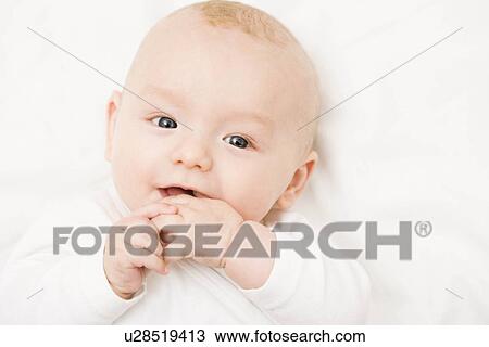 Baby smiling into camera View Large Photo Image Stock Image - Baby smiling into camera. Fotosearch