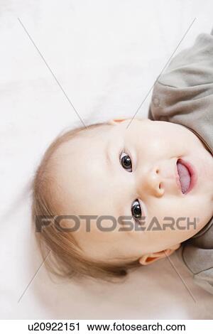 Baby smiling to camera View Large Photo Image Stock Image - Baby smiling to camera. Fotosearch