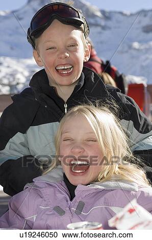 Boy and girl laughing View Large Photo Image Stock Image - Boy and girl laughing. Fotosearch