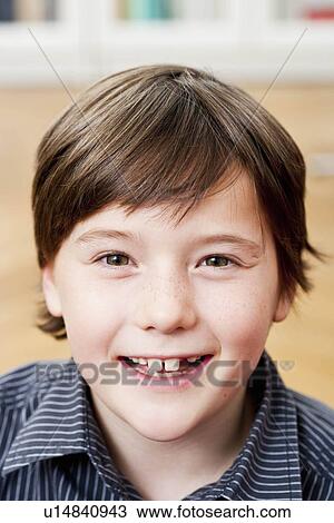 "Boy smiling to camera, portrait" View Large Photo Image Stock Image - "Boy smiling to camera, portrait". Fotosearch