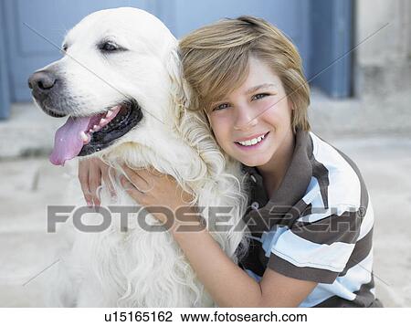 "Boy smiling, with dog on door step" View Large Photo Image Stock Image - "Boy smiling, with dog on door step". Fotosearch