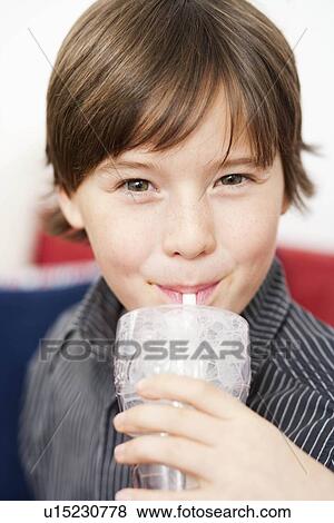Stock Photo - Boy with drink. Fotosearch