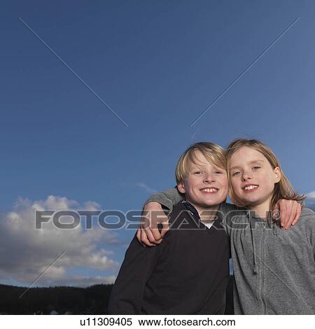Boys standing with arms crossed View Large Photo Image Stock Photography - Boys standing with arms crossed. Fotosearch
