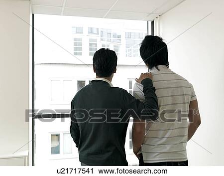 Stock Image - Business man and trainee. Fotosearch