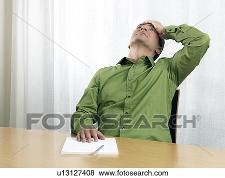 Stock Photo - Business man conference table. Fotosearch