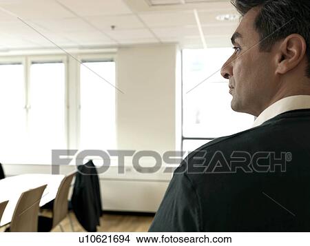 Business man looking away View Large Photo Image Picture - Business man looking away. Fotosearch