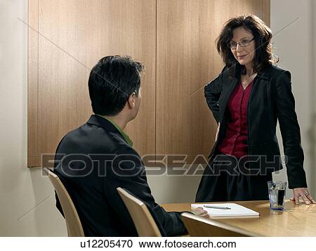 "Business meeting, woman standing" View Large Photo Image Stock Image - "Business meeting, woman standing". Fotosearch