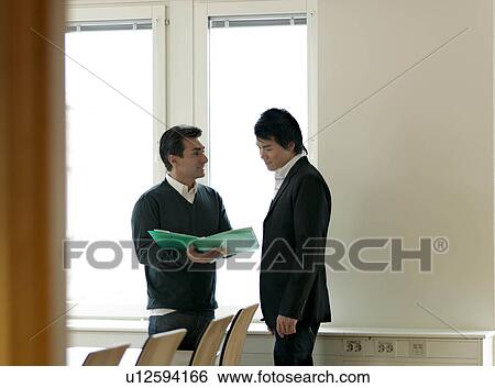 Business men with folder View Large Photo Image Stock Photograph - Business men with folder. Fotosearch