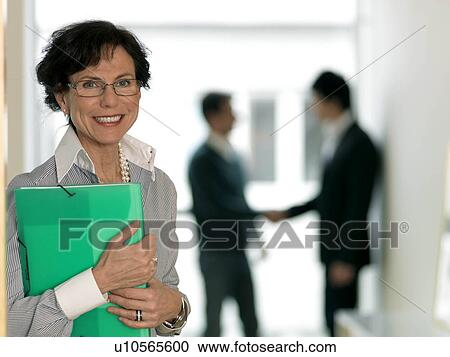 Business woman with folder View Large Photo Image Stock Image - Business woman with folder. Fotosearch