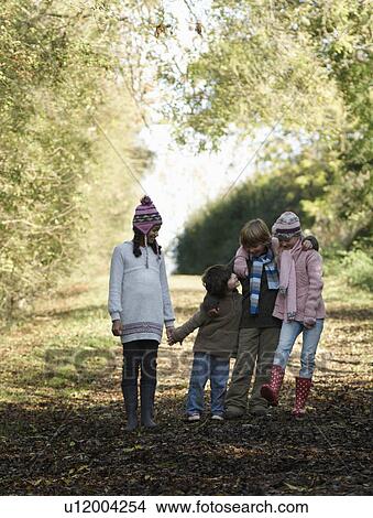 Children chatting on country lane View Large Photo Image Picture - Children chatting on country lane. Fotosearch