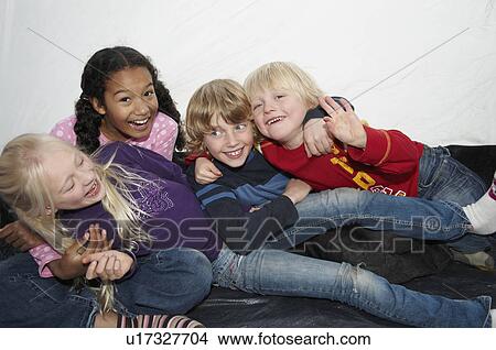 Picture - Children playing in tent. Fotosearch