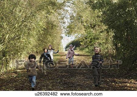Children running down country lane View Large Photo Image Stock Image - Children running down country lane. Fotosearch
