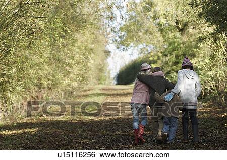 Stock Photograph - Children walking up country lane. Fotosearch