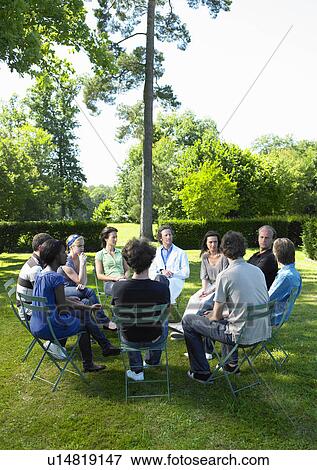 "Circle of people in rehab, outdoors" View Large Photo Image Stock Photo - "Circle of people in rehab, outdoors". Fotosearch